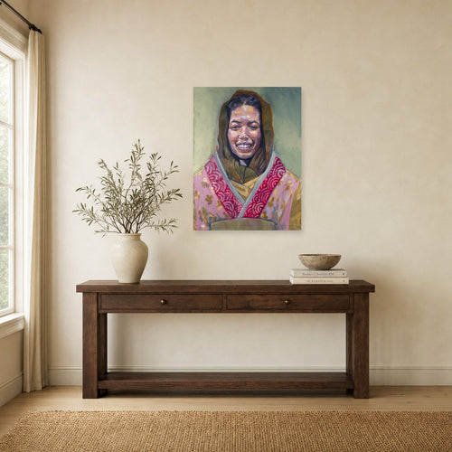 Aliyah Enters by Marvin Espy shown to scale on a wall above a wooden console table