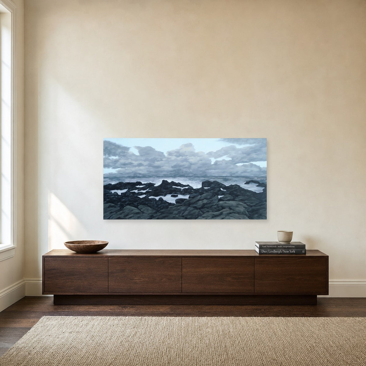 Evening Coast by Freya Grand shown to scale on a wall above a walnut sideboard