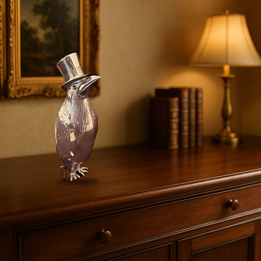 From Spain, Silver Plated Novelty Penguin Figurine with a Top Hat and Cane displayed on a dark wood sideboard
