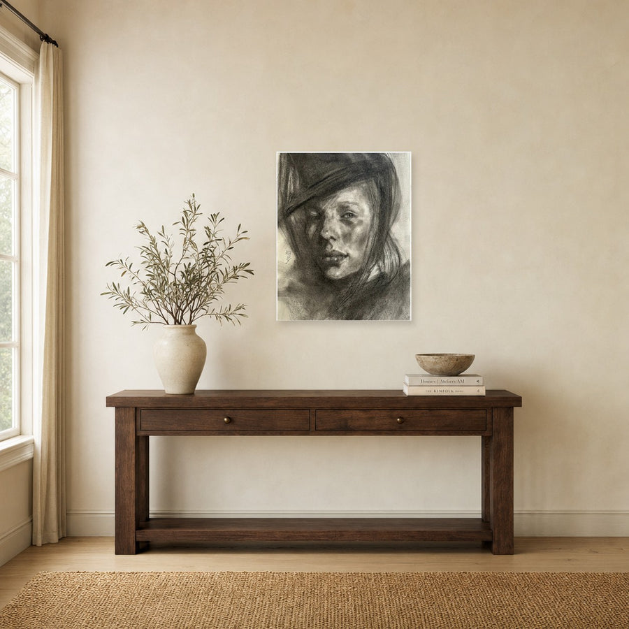 Mysterious Woman by Marvin Espy shown to scale on a wall above a wooden console table