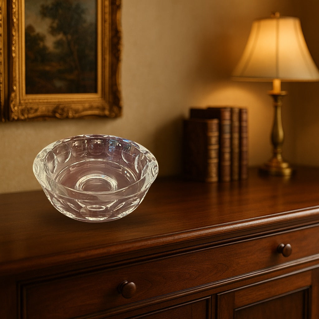 Orrefors Torup Crystal Bowl displayed on a dark wood sideboard