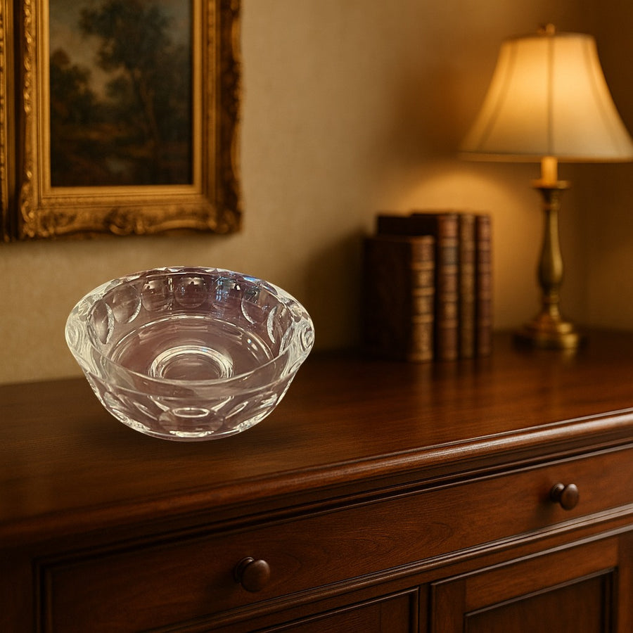 Orrefors Torup Crystal Bowl displayed on a dark wood sideboard