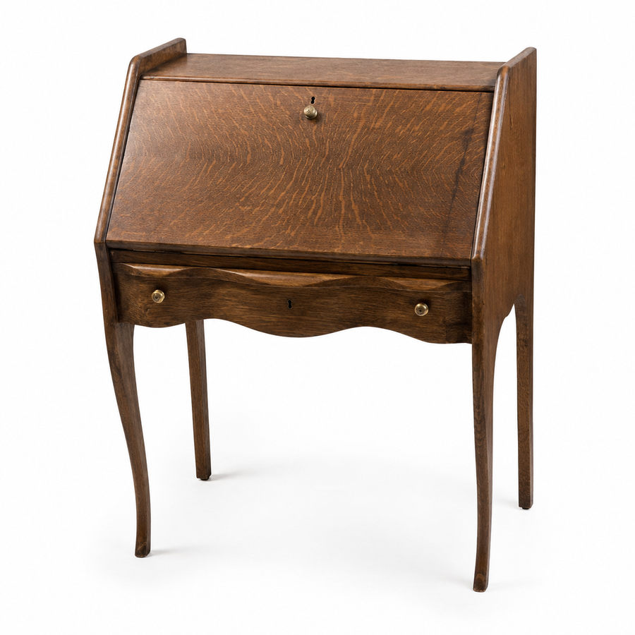 Oak slant-front secretary desk with cabriole legs on a white background